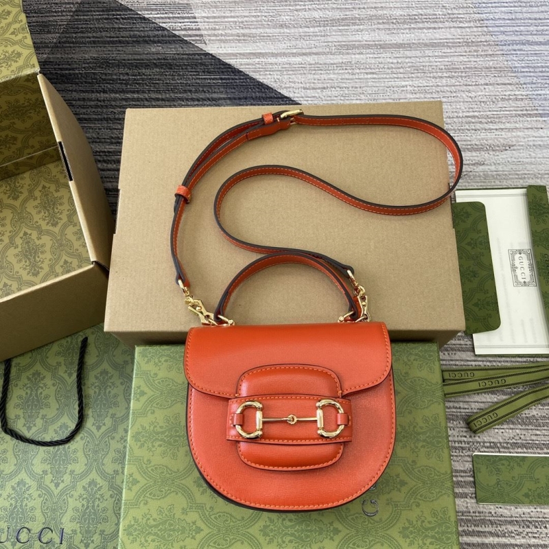 G*u*i top handle bags